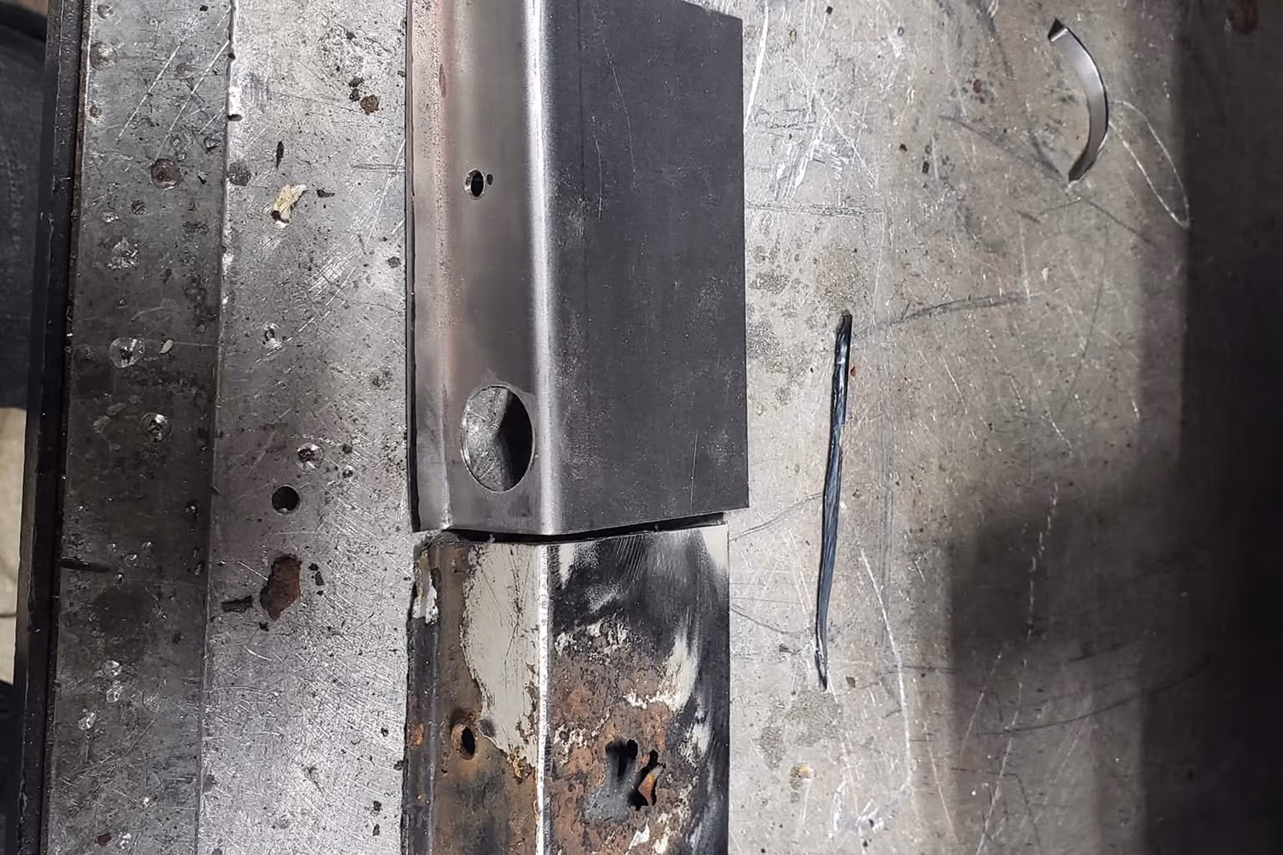 Before and after comparison of rusted part and custom fabricated replacement