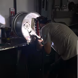 Precision TIG welding on aluminum wheel