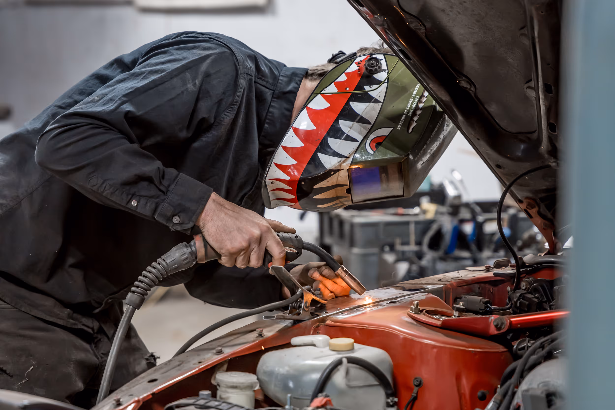 Dan about to weld a custom metal fabrication piece