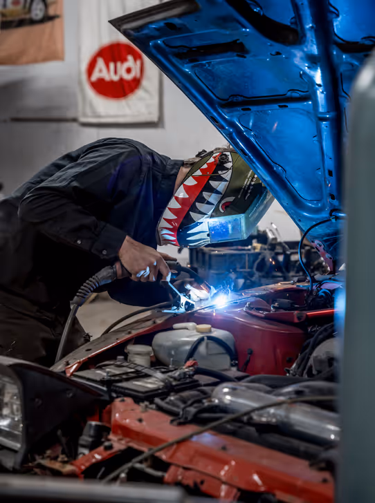 Dan starting to weld a custom metal shaping project